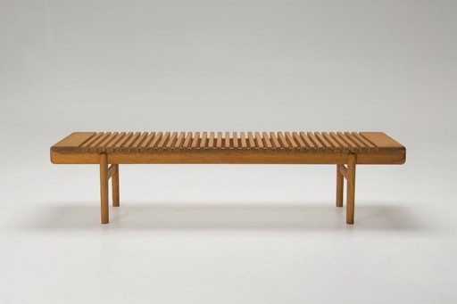 Una panca da bar "JH589" - Hans J. Wegner