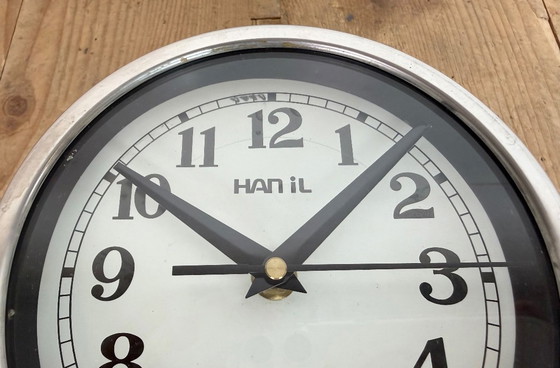 Image 1 of Vintage zwarte Hanil scheepswandklok, jaren 80