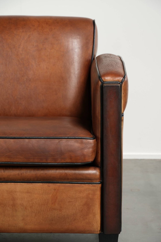 Sehr interessanter Art Deco Design Sessel aus Schafsleder mit tollem Design und schönen Farben – Leather (photo 9 of 12)