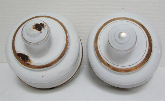 Image 1 of four enameled metal cheese bells, early 20th century