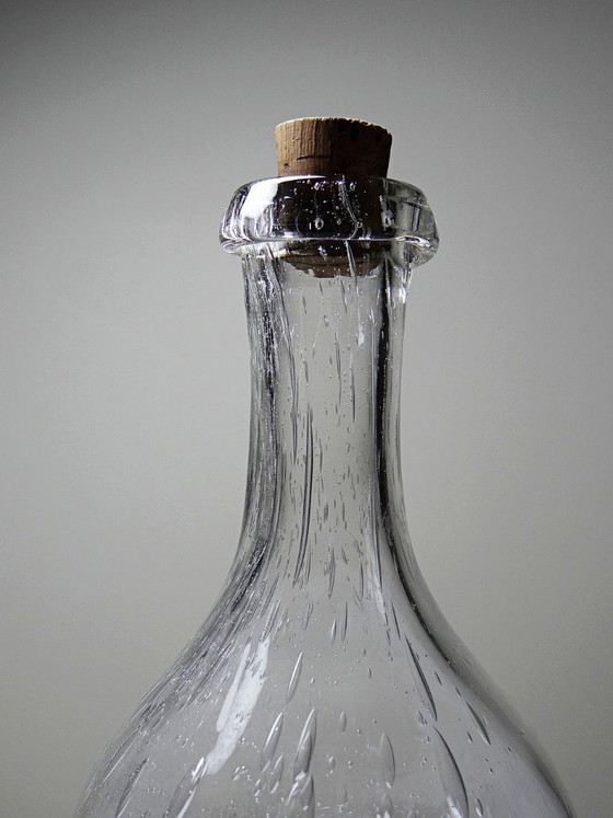 Image 1 of Large antique bottle in blown glass with bubbles, early 20th century, 1900-1920