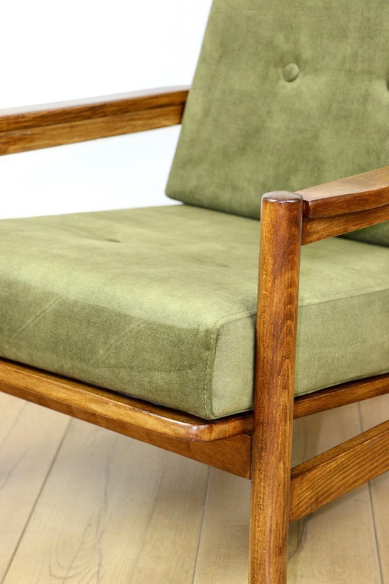 Image 1 of Wooden armchair designed by Z. Baczyk in a vintage style, upholstered in olive green velvet.