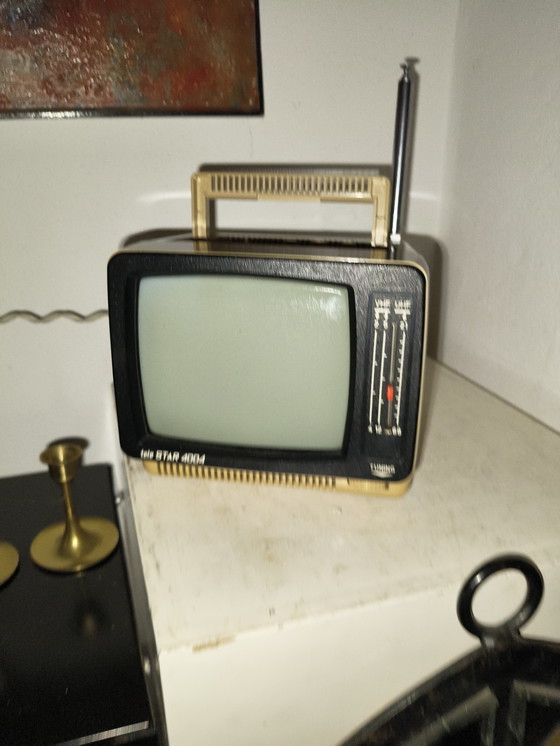 Image 1 of Televisore Tele Star 4004 in plastica dal design vintage, stile spaziale