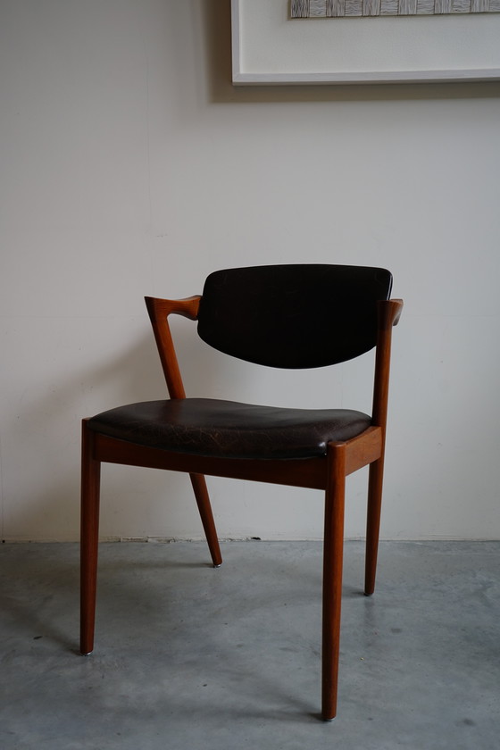 Image 1 of 6 Kai Kristiansen stoelen | Model 42 | Teak Leder patina