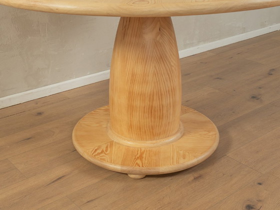 Image 1 of Esstisch aus den 80er Jahren mit dickem Holzgestell