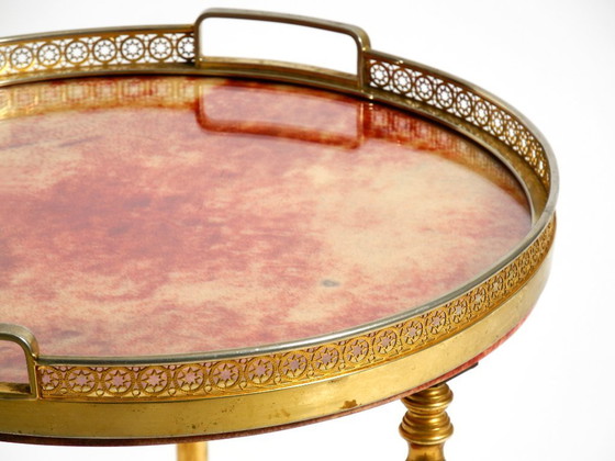 Image 1 of Round, small 1960s Aldo Tura serving or bar trolley in red goatskin leather | Made in Italy