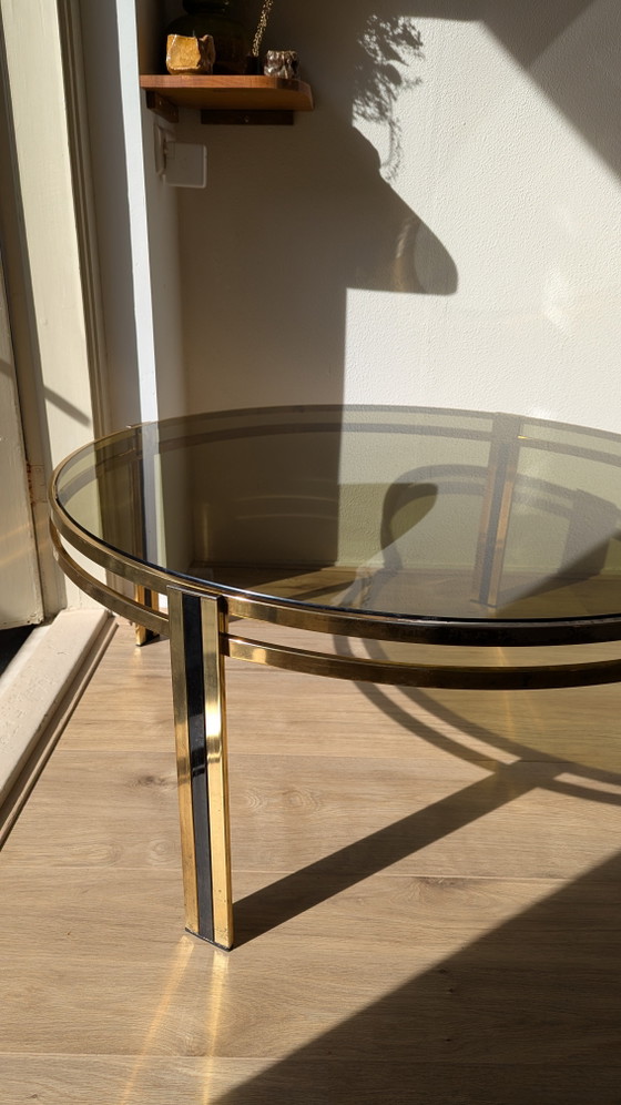 Image 1 of Hollywood Regency salontafel van zwart messing en gerookt glas