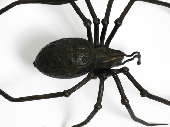 Image 1 of Prachtige Italiaanse Mid Century Moderne "Spin" wanddecoratie van ijzer