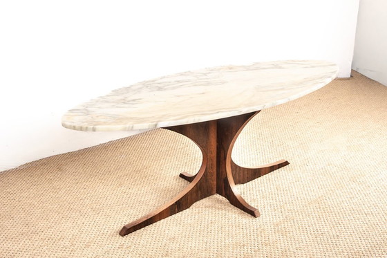 Image 1 of Oval coffee table in Carrara marble and rosewood by Hugues Poignant 1960.