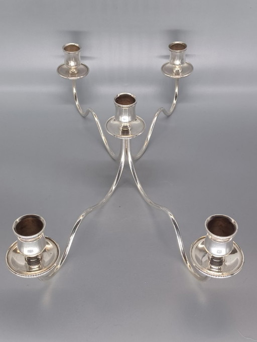 Candelabro a cinque bracci in metallo argentato, punzonato