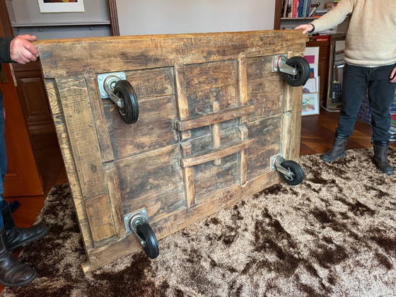 Image 1 of Unique industrial coffee table made of (monastery) wood on wheels