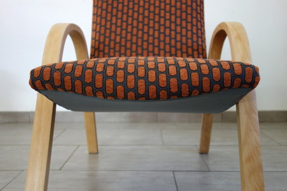 Image 1 of Een paar Bow Wood fauteuils van Steiner, jaren 1950.