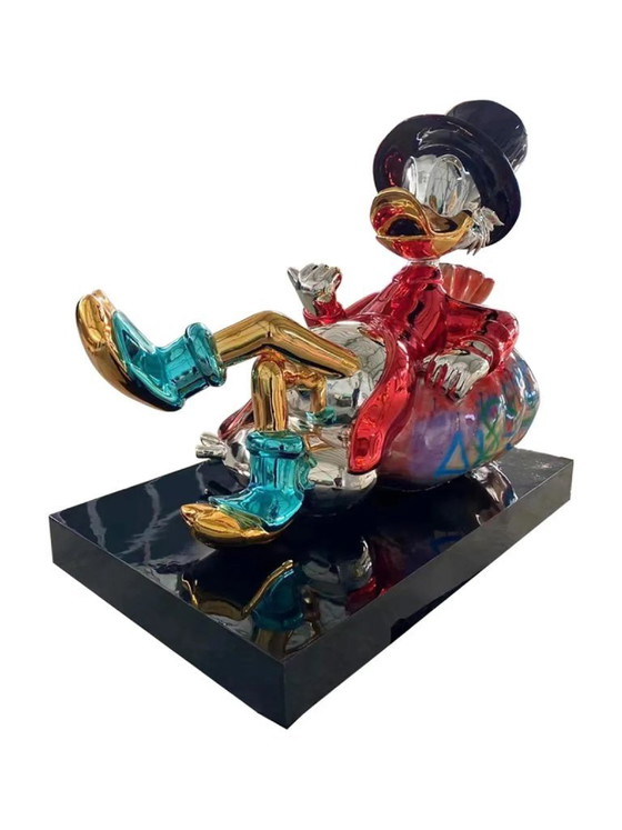 Image 1 of Fiberglas-Skulptur – Ente mit Geld, Comicfigur – Mehrfarbig