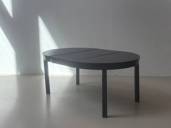 IKEA BJURSTA extendable dining table in black-brown – Wood (photo 7 of 14)