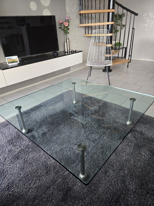 Design glass table with stainless steel legs; square model