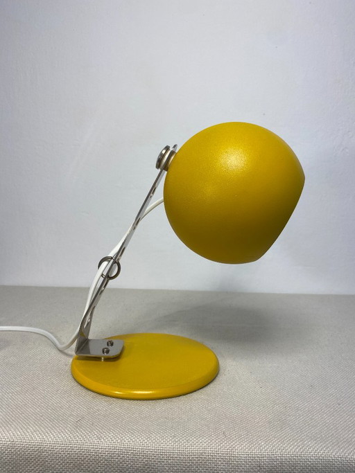 Yellow metal table lamp