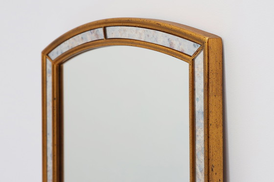 Image 1 of Mirror by Deknudt with marbled fume glass side panels in gilded wooden frame