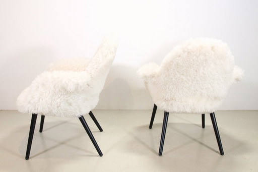 2 Vitra Organic Chairs by Charles Eames and Eero Saarinen