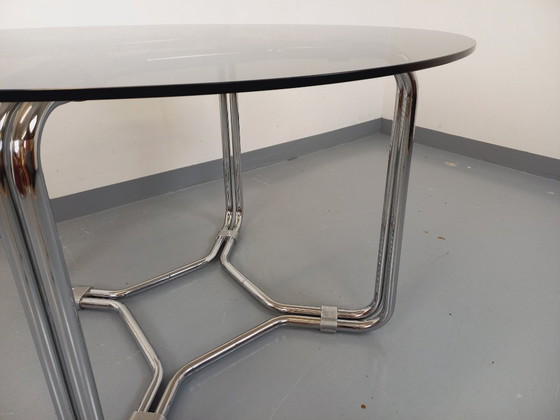 Image 1 of Round vintage dining table in smoked glass and chromed metal in the Space Age style of the 70s