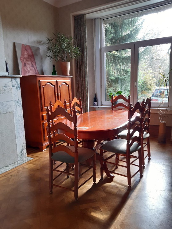 Image 1 of Cherry dining room with table, 6 chairs, bar cabinet and sideboard