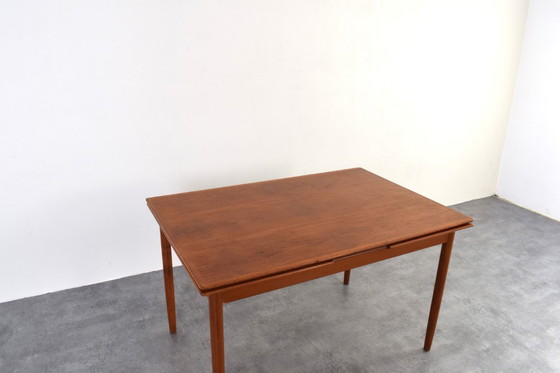 Image 1 of Table de salle à manger extensible en teck danois, style milieu du XXe siècle, années 1960.