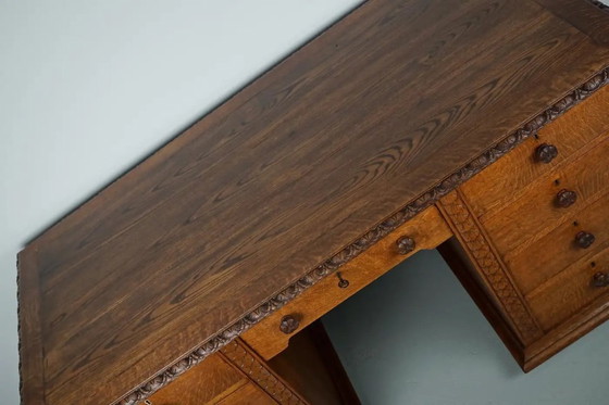 Image 1 of Antiker niederländischer Jugendstil-Schreibtisch/-Theke aus geschnitzter Eiche, frühes 20. Jahrhundert