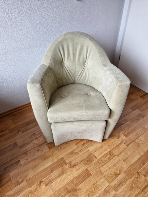 2 x Leolux fauteuil Carabas met voetenbank