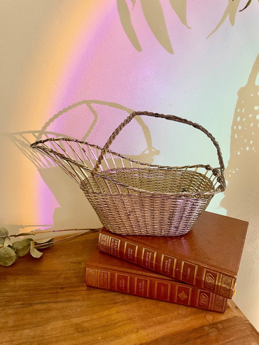 Braided silver metal bottle holder