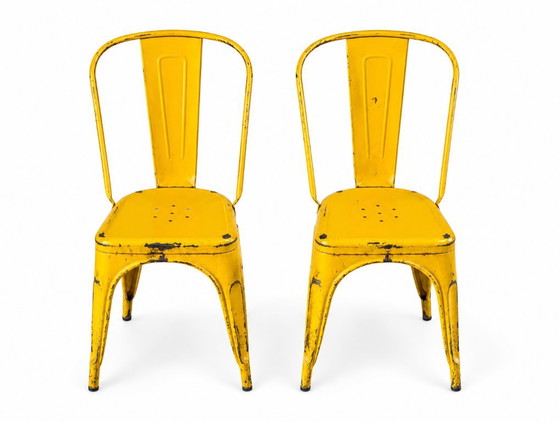 Set of 4 Tolix chairs, 2 yellow, 2 blue. 1960s edition. – Dining chairs, Metal (photo 4 of 8)