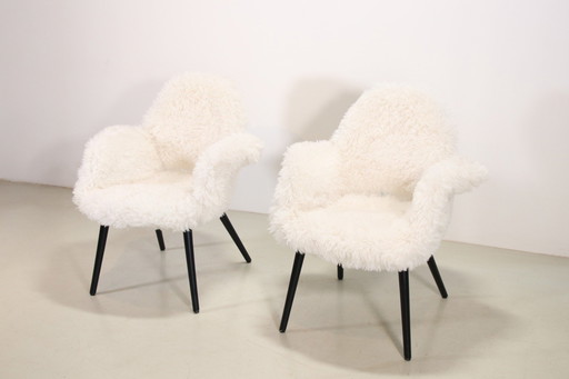 2 Vitra Organic chairs door Charles Eames en Eero Saarinen