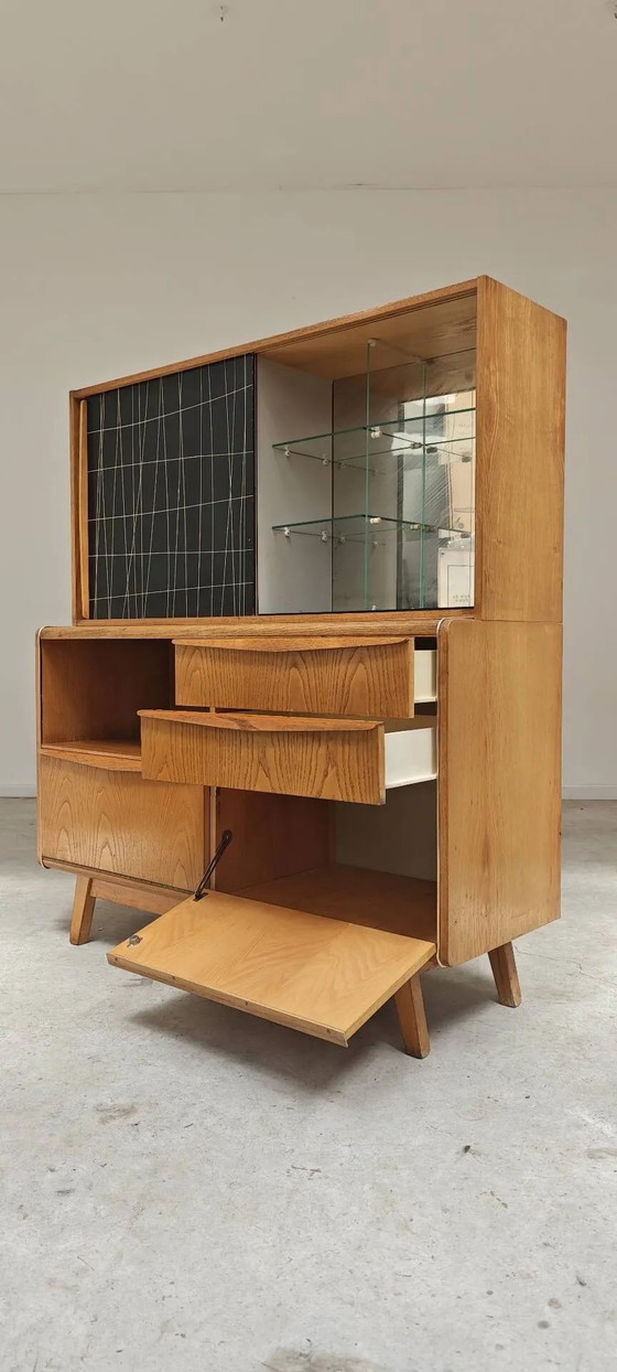 High buffet / Sideboard U 372 / 386 by B Landsman and H Nepozytek 60 – Jitona, Display cabinets, Wood, Glass (photo 36 of 40)