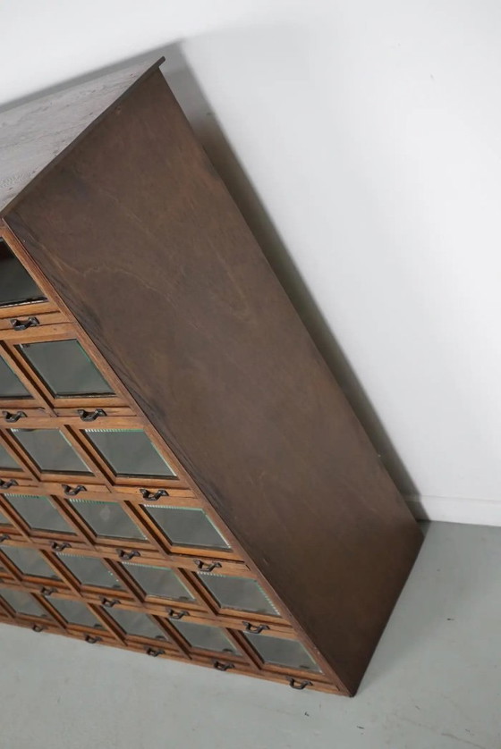 Image 1 of Mobiletto antico tedesco in rovere per merceria, anni '20/'30