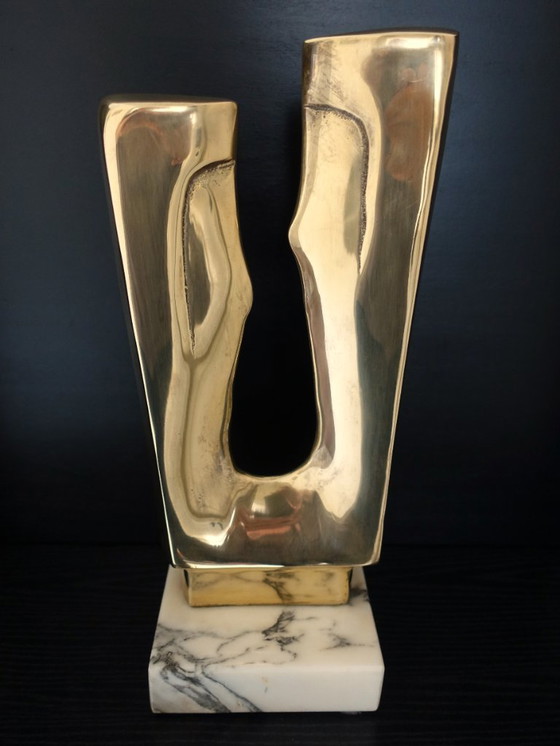 Image 1 of Sculpture en laiton poli d'après Gérard Koch.