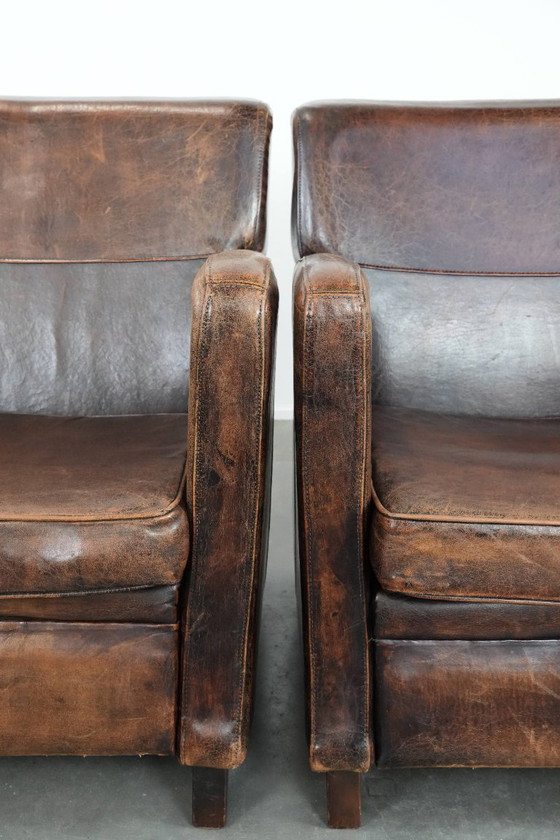 Image 1 of 2 eleganti poltrone di design in pelle di pecora con splendidi colori intensi e un design senza tempo