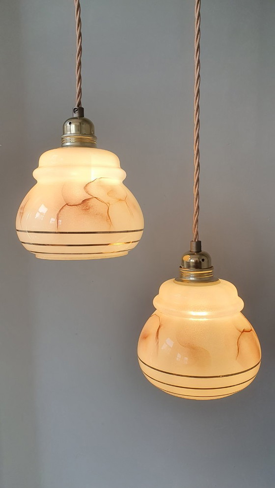 Image 1 of vintage gemarmerde opaline hanglampen met gouden decoratie