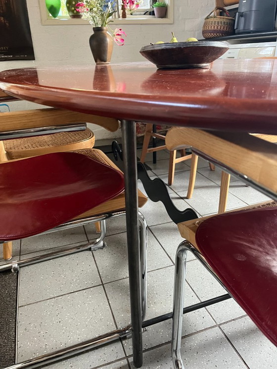 Image 1 of Beautiful wooden design table Maroeska Metz steel frame with curl 240/1.20