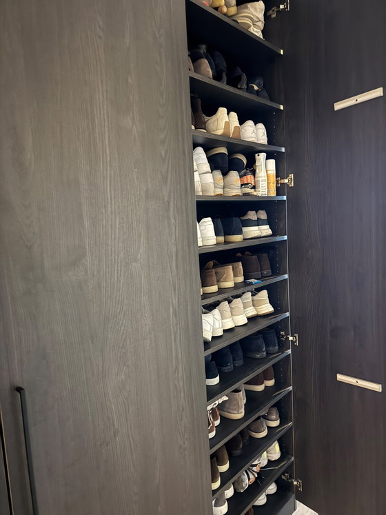 Image 1 of Custom-made wardrobe / clothes cupboard in brown/black wood. 260 high