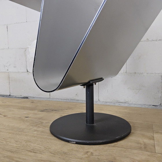 Image 1 of Modern curved metal minimalist side table with magazine rack / newspaper rack / magazine rack