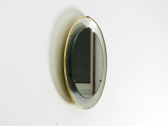 Image 1 of Rare miroir rond illuminé en métal Hillebrand, datant du milieu du XXe siècle (1966).