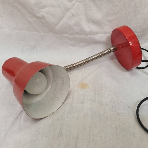 Oranje metalen lamp uit 1970