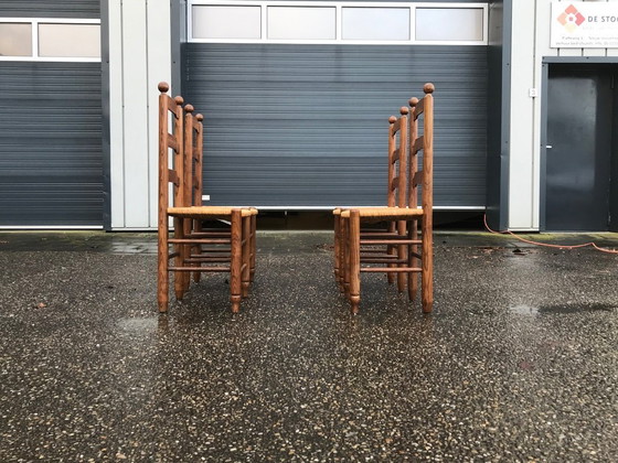 Image 1 of Esszimmerstühle aus Eiche und Geflecht Georges Robert France 1960s