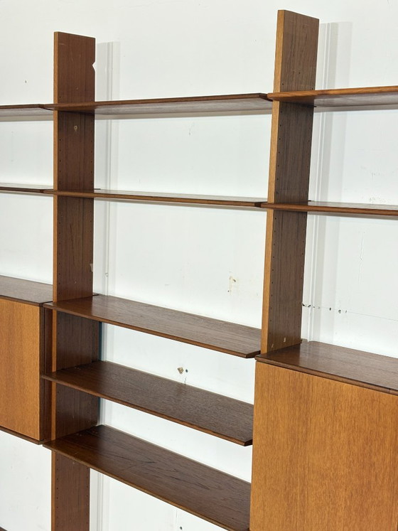 Modular mid-century wall shelf by interna-Peter Pedrides / Teak shelving system 1960s – Shelving unit, Wood (photo 13 of 27)