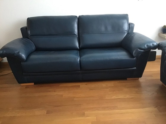 Image 1 of 2 blue leather sofas