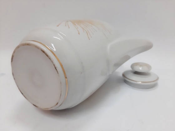 Image 1 of Pichet vintage en porcelaine à motif ensoleillé avec couvercle