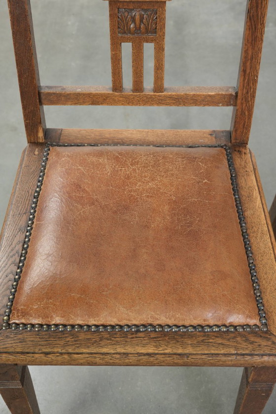 Image 1 of Ensemble de 4 chaises de salle à manger anciennes en chêne de style Art nouveau, recouvertes de peau de mouton.