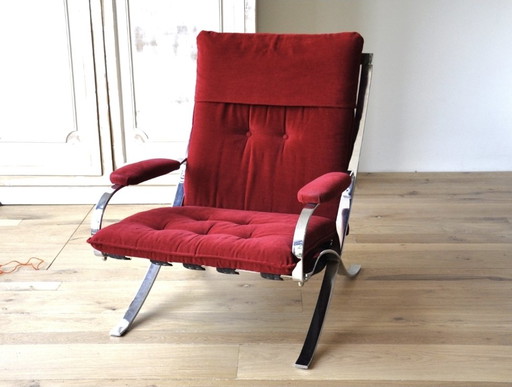 Set of red armchairs.