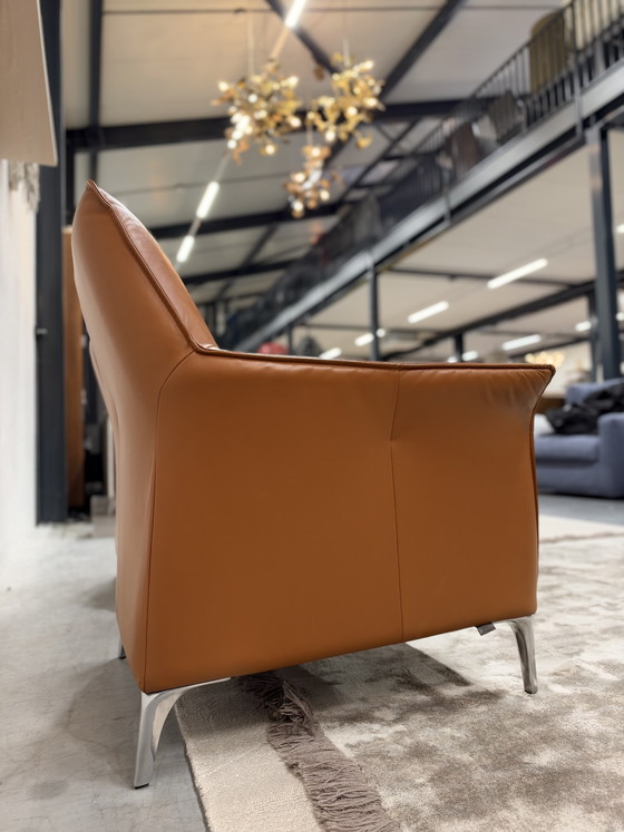 2 Poltrone Leolux Mayuro con pouf Pelle marrone, Arancione (foto 7 di 9)