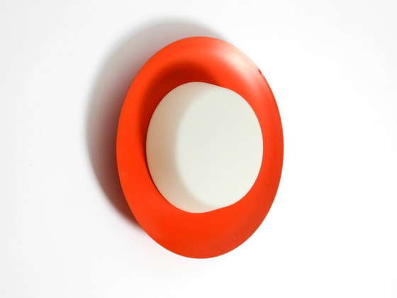 Image 1 of Grote Mid Century wand- of plafondlamp van glas met metalen reflector in rood van Kaiser Leuchten