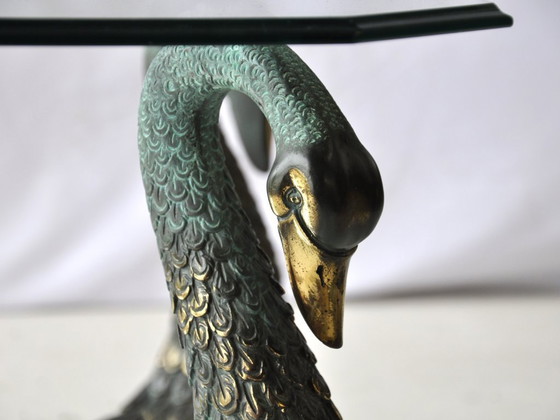 Image 1 of Vintage glazen salontafel met sculpturaal zwanenframe en glazen blad