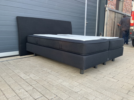 Image 1 of Auping Boxspring 160x200 nero con materassi Auping Cresto in ottime condizioni!